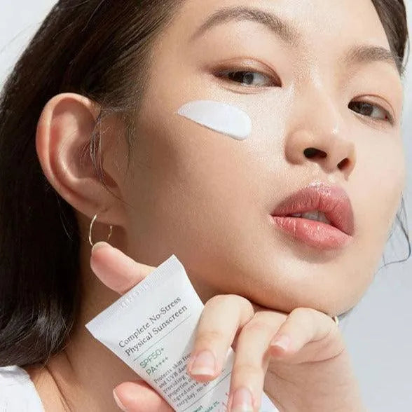 Model applying Axis-Y Complete No Stress Physical Sunscreen, Korean skincare at Me Time Groningen