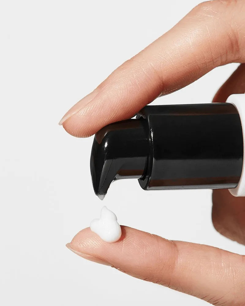 COSRX Advanced Snail Peptide Eye Cream dispensed on fingertip, Korean skincare Nederland