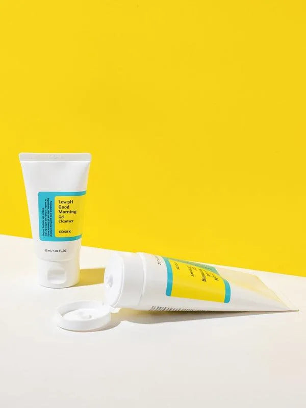 COSRX Low pH Good Morning Gel Cleanser product on white table with yellow background, Korean skincare Me Time Groningen