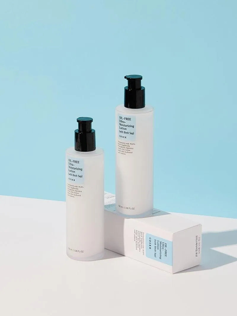 COSRX Oil-Free Ultra-Moisturizing Lotion bottles on white and blue background, Korean skincare at Me Time Groningen