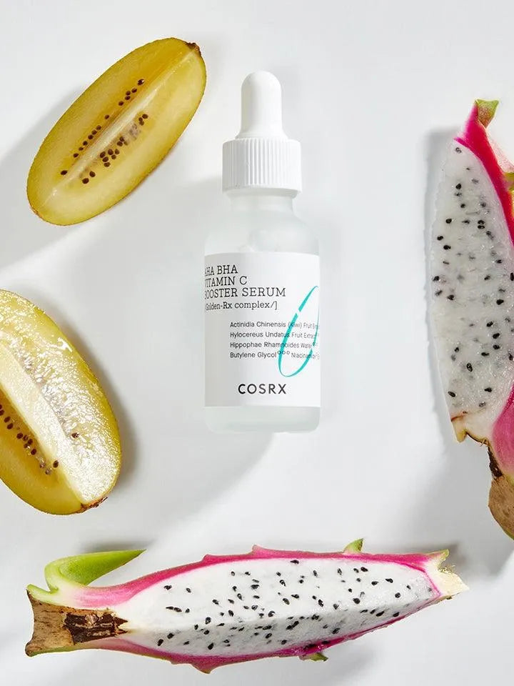 COSRX Refresh AHA BHA Vitamin C Booster Serum bottle with kiwi and dragon fruit on white background, Korean skincare Nederland at Me Time Groningen.