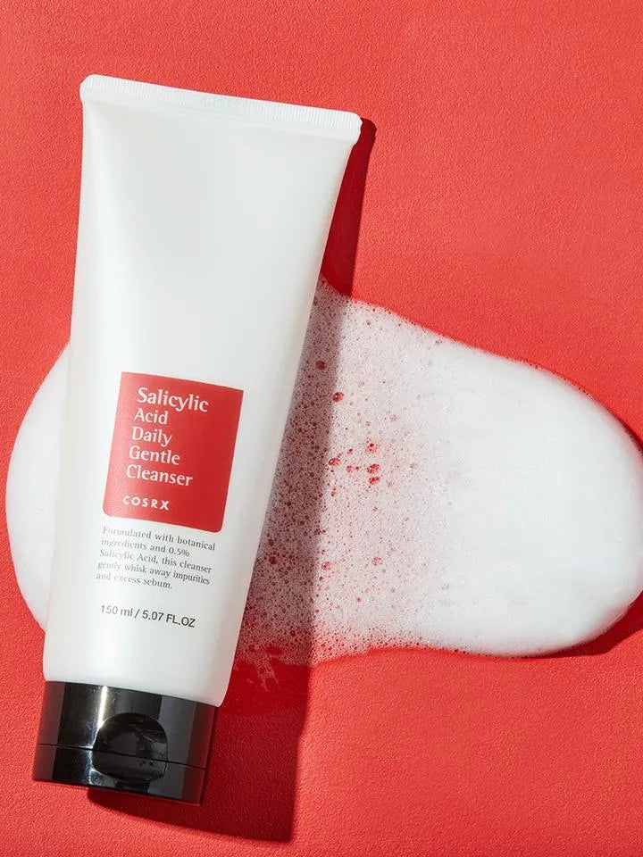COSRX Salicylic Acid Daily Gentle Cleanser on red background with foam, Korean skincare Nederland
