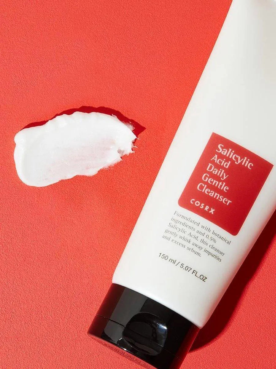 COSRX Salicylic Acid Daily Gentle Cleanser on red background, Korean skincare product Me Time Groningen