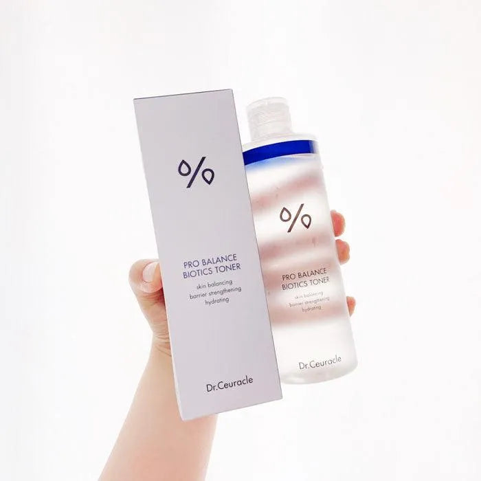 Dr. Ceuracle Pro Balance Biotics Toner bottle and box held by hand, Korean skincare product