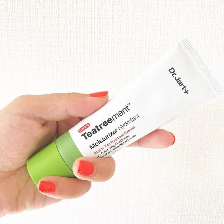Hand holding Dr.Jart+ Teatreement Moisturizer tube, Korean skincare at Me Time Groningen