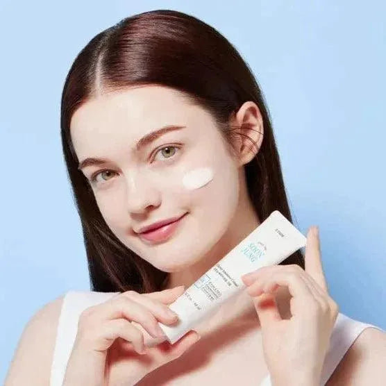 Woman applying Etude House Soon Jung 2x Barrier Intensive Cream, Korean skincare at Me Time Groningen