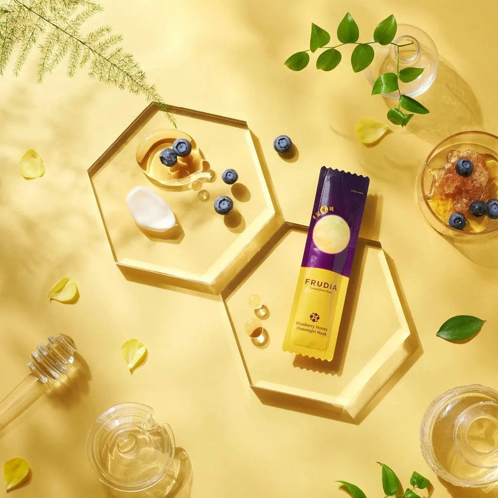 Frudia Blueberry Honey Overnight Mask with honey, blueberries, and skincare elements on yellow background