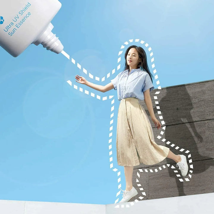 Korean skincare product Frudia Ultra UV Shield Sun Essence with woman outdoors, Me Time Groningen