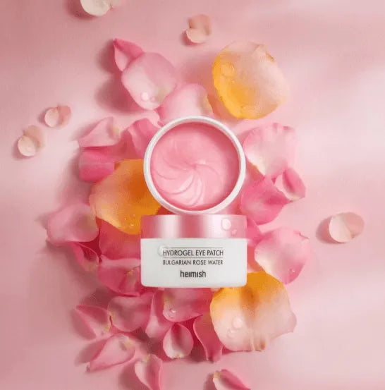 Heimish Bulgarian Rose Water Hydrogel Eye Patch on pink rose petals, Korean skincare Me Time Groningen