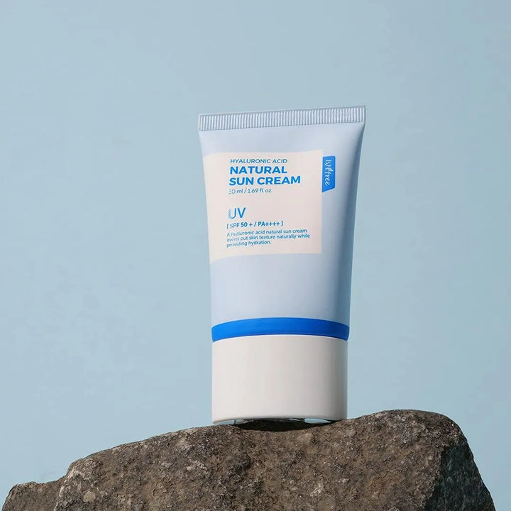 Isntree Hyaluronic Acid Natural Sun Cream SPF 50 on a rock, Korean skincare Nederland