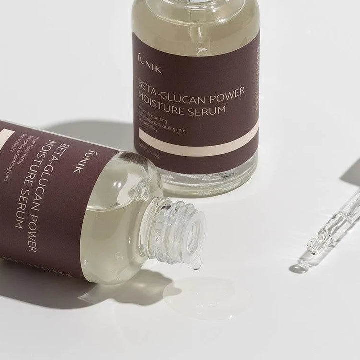 iUNIK Beta-Glucan Power Moisture Serum bottles on white surface, Korean skincare product