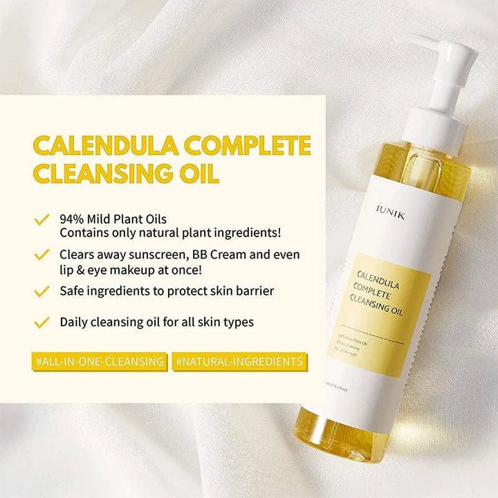 iUNIK Calendula Complete Cleansing Oil bottle on white fabric with product benefits listed, Korean skincare Nederland