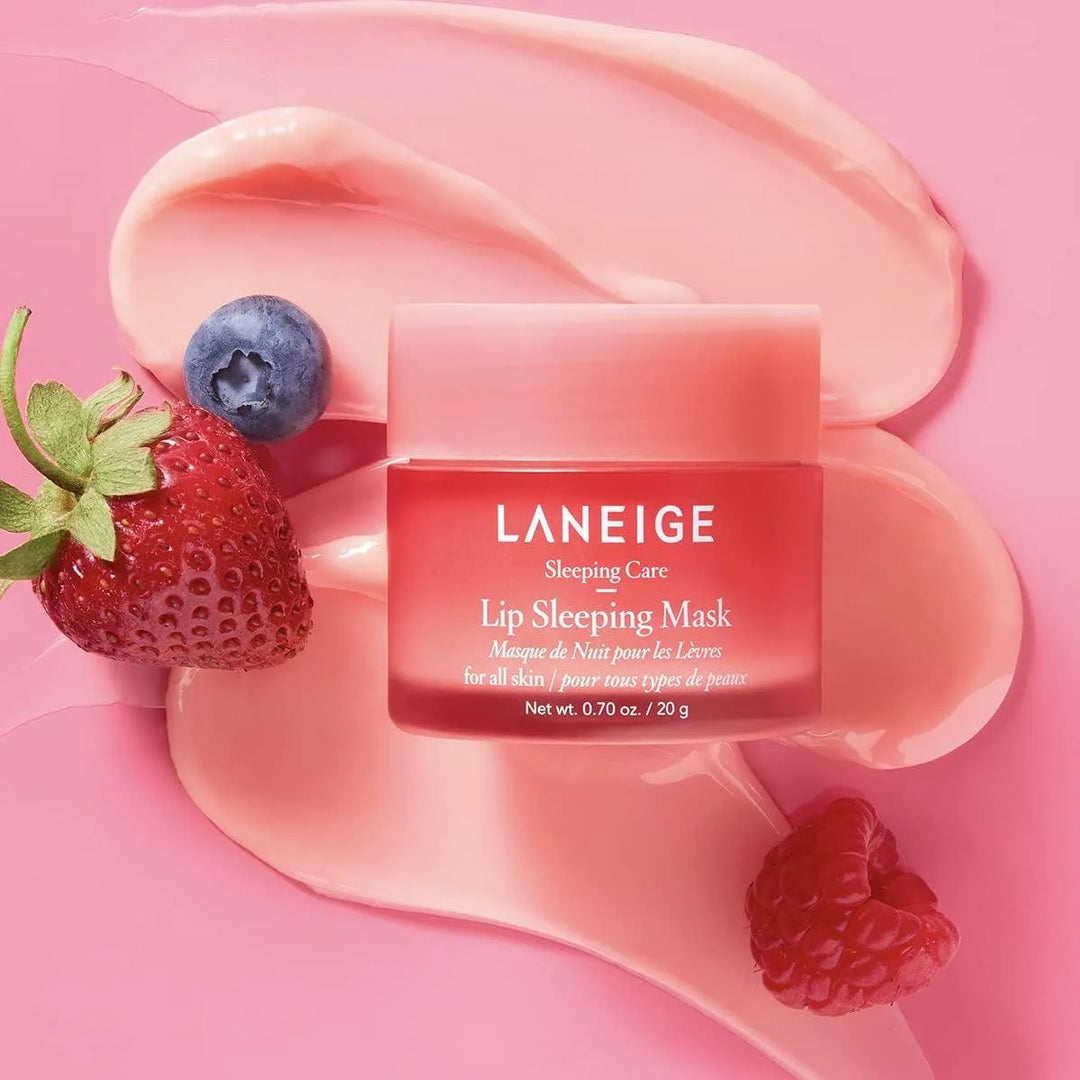 Laneige Lip Sleeping Mask Berry with strawberry, blueberry, raspberry on pink background, Korean skincare