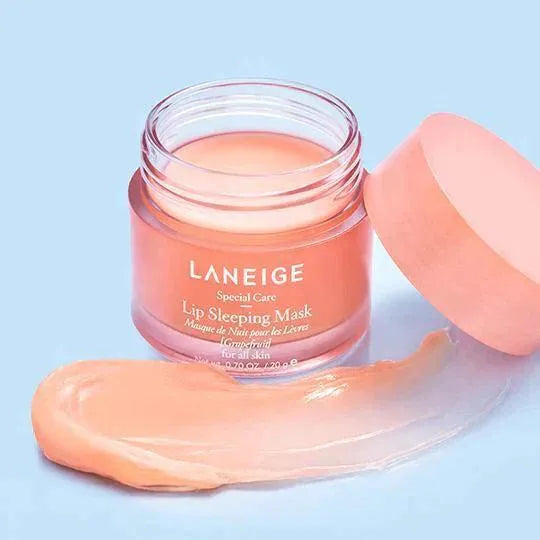 LANEIGE Lip Sleeping Mask EX Grapefruit Korean skincare jar with swatch on light blue background
