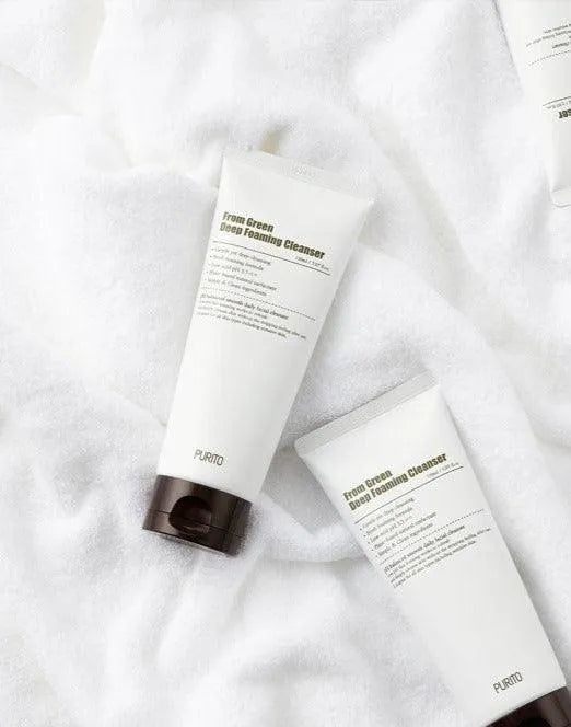 Purito From Green Deep Foaming Cleanser tubes on white towel, Korean skincare Netherlands