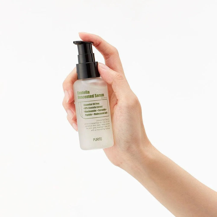 Hand holding Purito Centella Unscented Serum bottle, Korean skincare Me Time Groningen