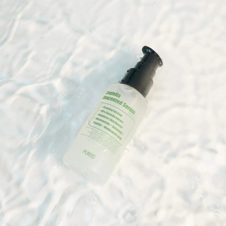 PURITO Centella Unscented Serum bottle on rippled water, Korean skincare Me Time Groningen