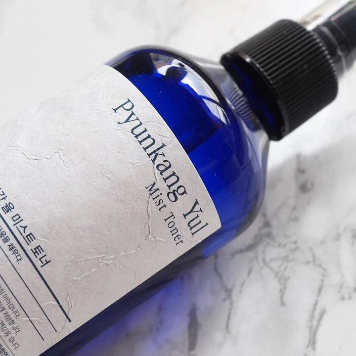 Pyunkang Yul Mist Toner blue bottle on marble, Korean skincare at Me Time Groningen