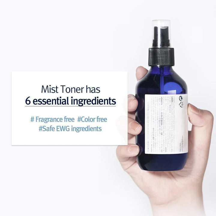 Hand holding blue Pyunkang Yul Mist Toner bottle, Korean skincare at Me Time Groningen.