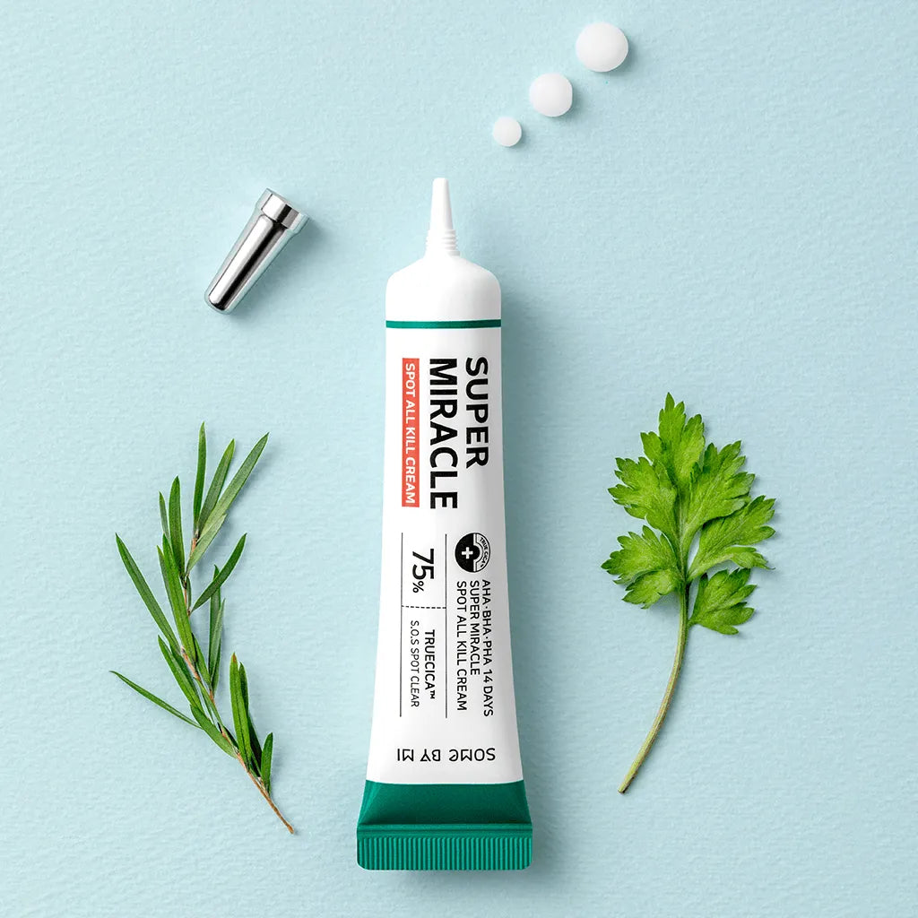 Some By Mi AHA BHA PHA Super Miracle Spot All Kill Cream tube on blue background with herbs, Korean skincare Me Time Groningen