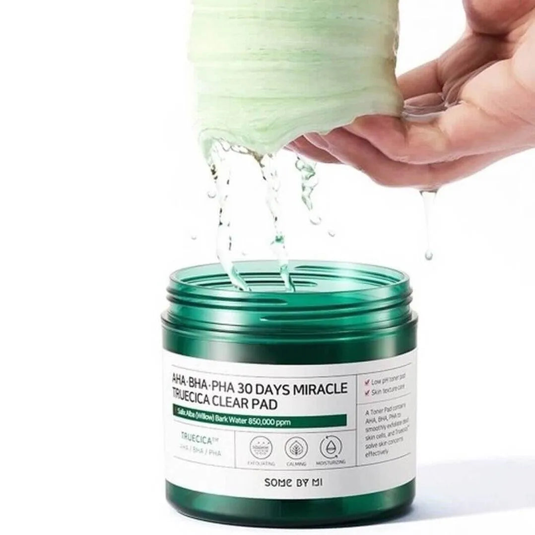 Some By Mi AHA BHA PHA 30 Days Miracle Truecica Clear Pad open jar with wet skincare pad