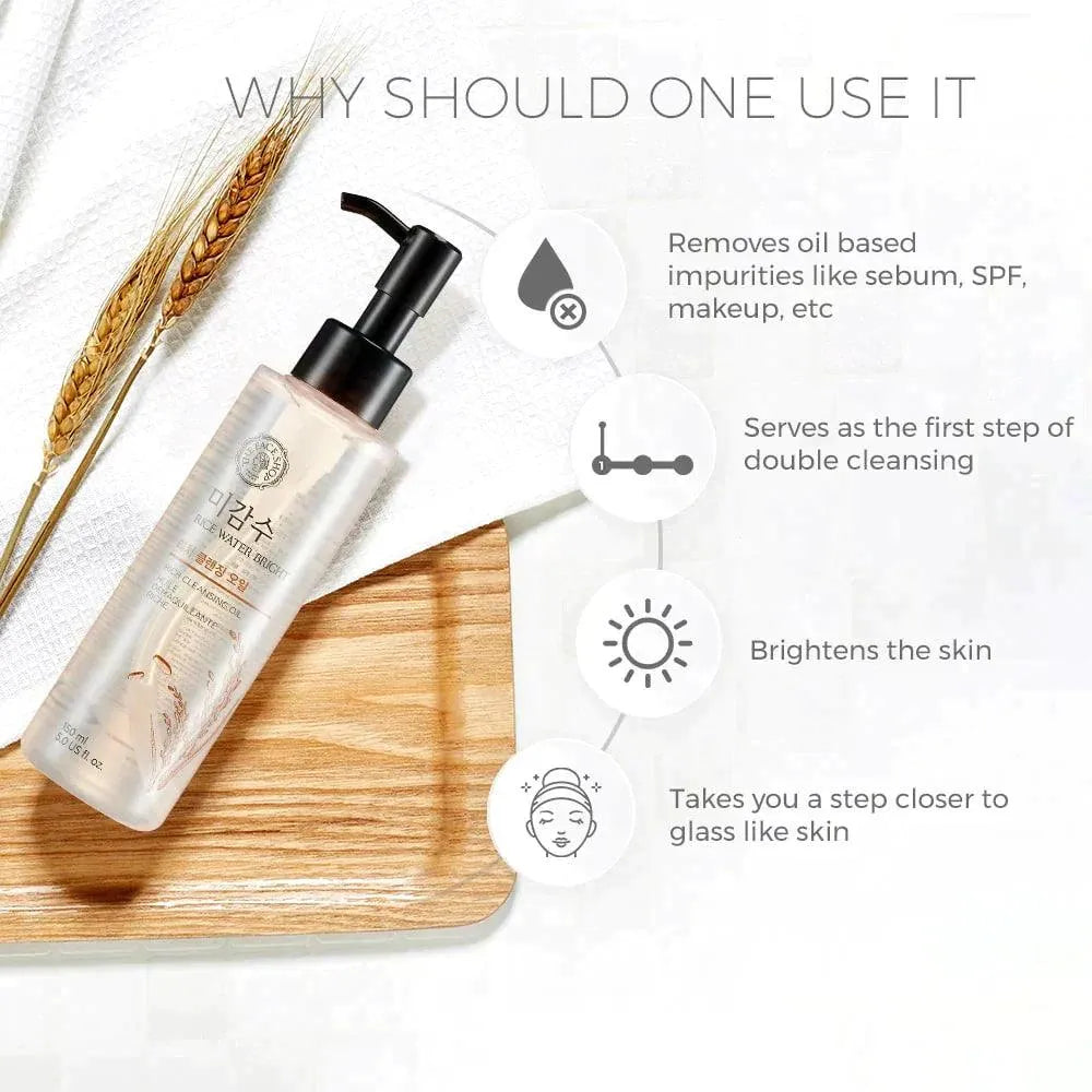 The Face Shop Rice Water Bright cleansing oil bottle on wooden tray with wheat, Korean skincare product.